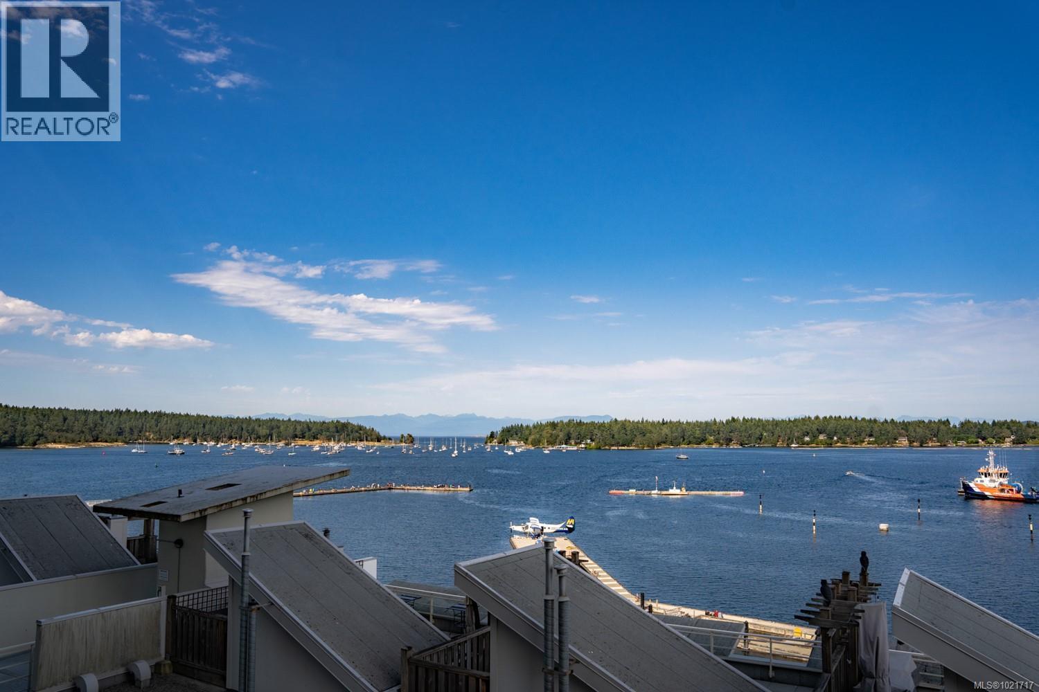 View from building towards Nanaimo Harbour. - 110 38 Front St, Nanaimo, BC - Outdoor With Body Of Water With View