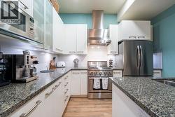 Large kitchen with plenty of storage. -