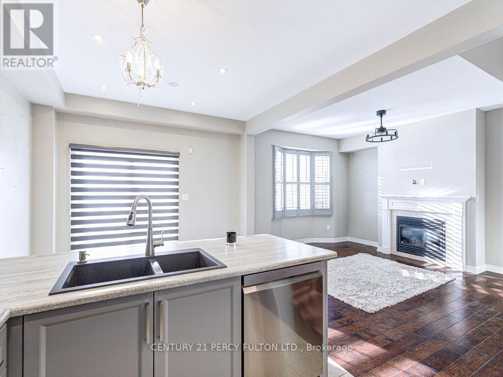 61 Bousfield Rise, Hamilton, ON - Indoor Photo Showing Kitchen With Fireplace With Double Sink