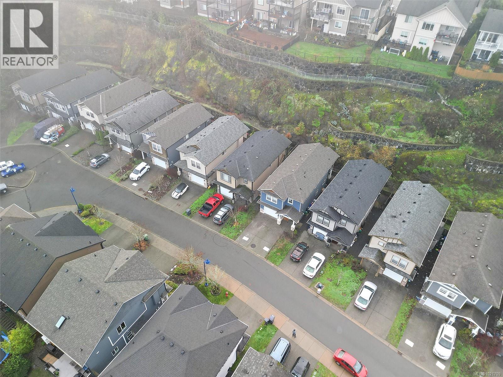 Aerial view of property's location with nearby suburban area - 883 Wild Ridge Way, Langford, BC - Other