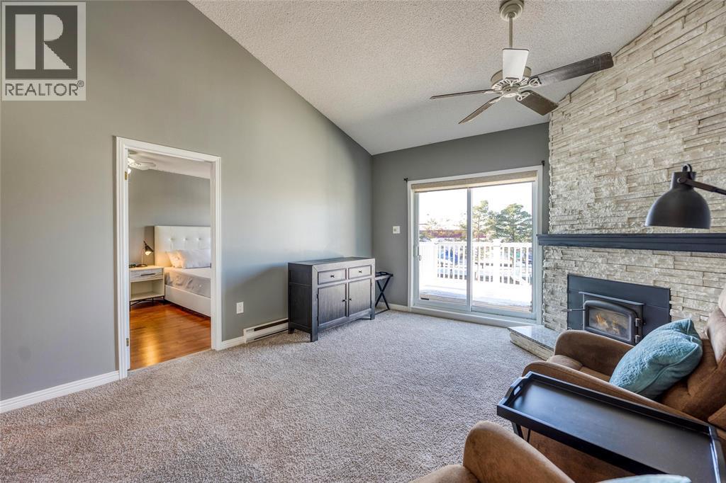 1500 Venetian Boulevard Unit# W-29, Point Edward, ON - Indoor With Fireplace