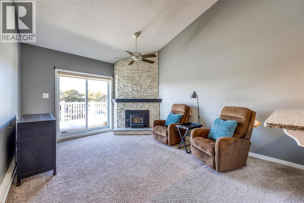 1500 Venetian Boulevard Unit# W-29, Point Edward, ON - Indoor With Fireplace