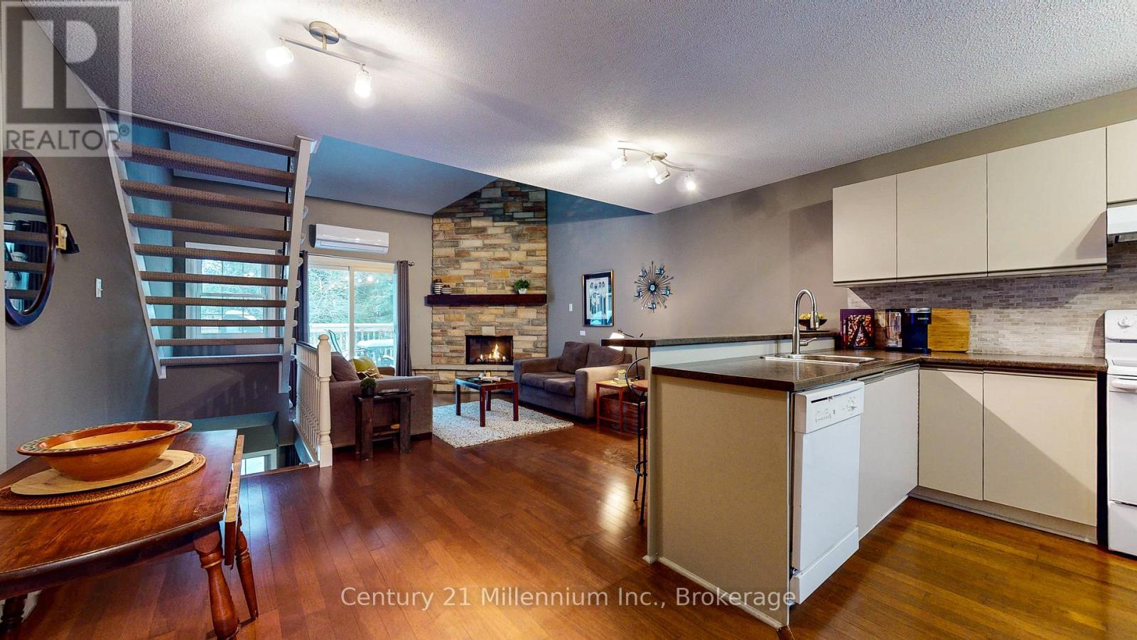 Open-Concept Kit/Din/Living - 124 - 150 Victoria Street S, Blue Mountains, ON - Indoor Photo Showing Kitchen With Fireplace