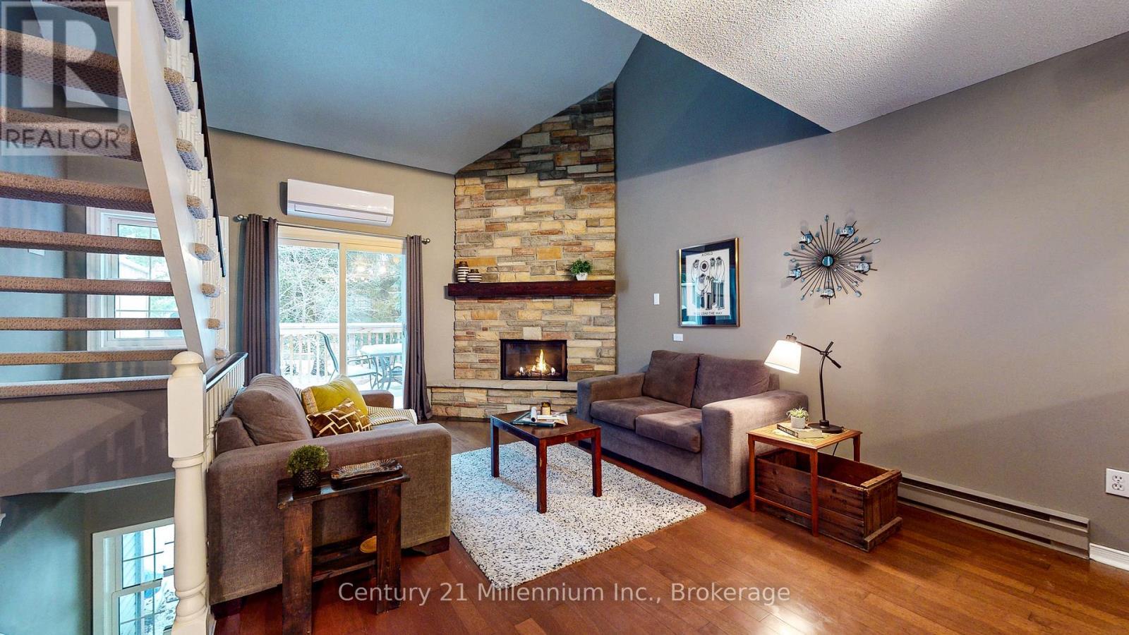Living Room - 124 - 150 Victoria Street S, Blue Mountains, ON - Indoor Photo Showing Living Room With Fireplace