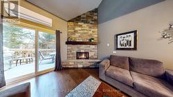 Gas Fireplace & Wall-Mounted Mini-Split A/C Unit -