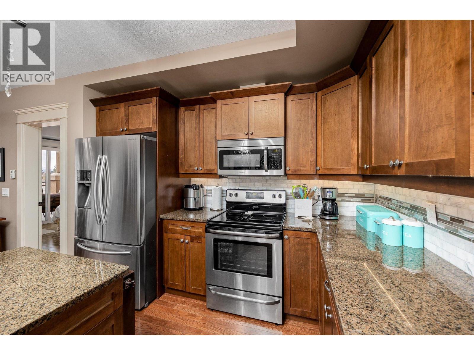 2070 Boucherie Road Unit# 403, Westbank, BC - Indoor Photo Showing Kitchen With Stainless Steel Kitchen