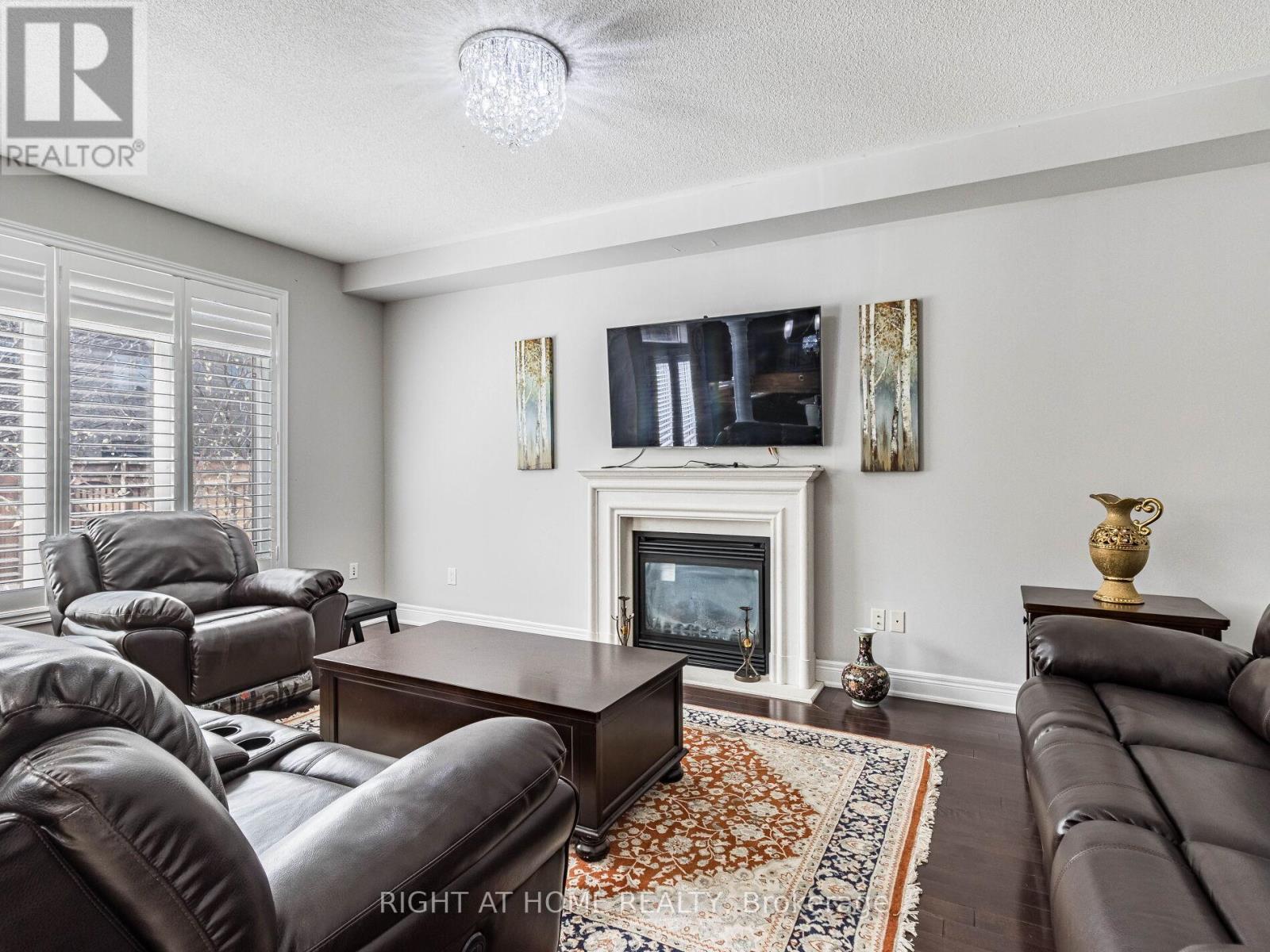 2340 Thruxton Drive, Oakville, ON - Indoor Photo Showing Living Room With Fireplace