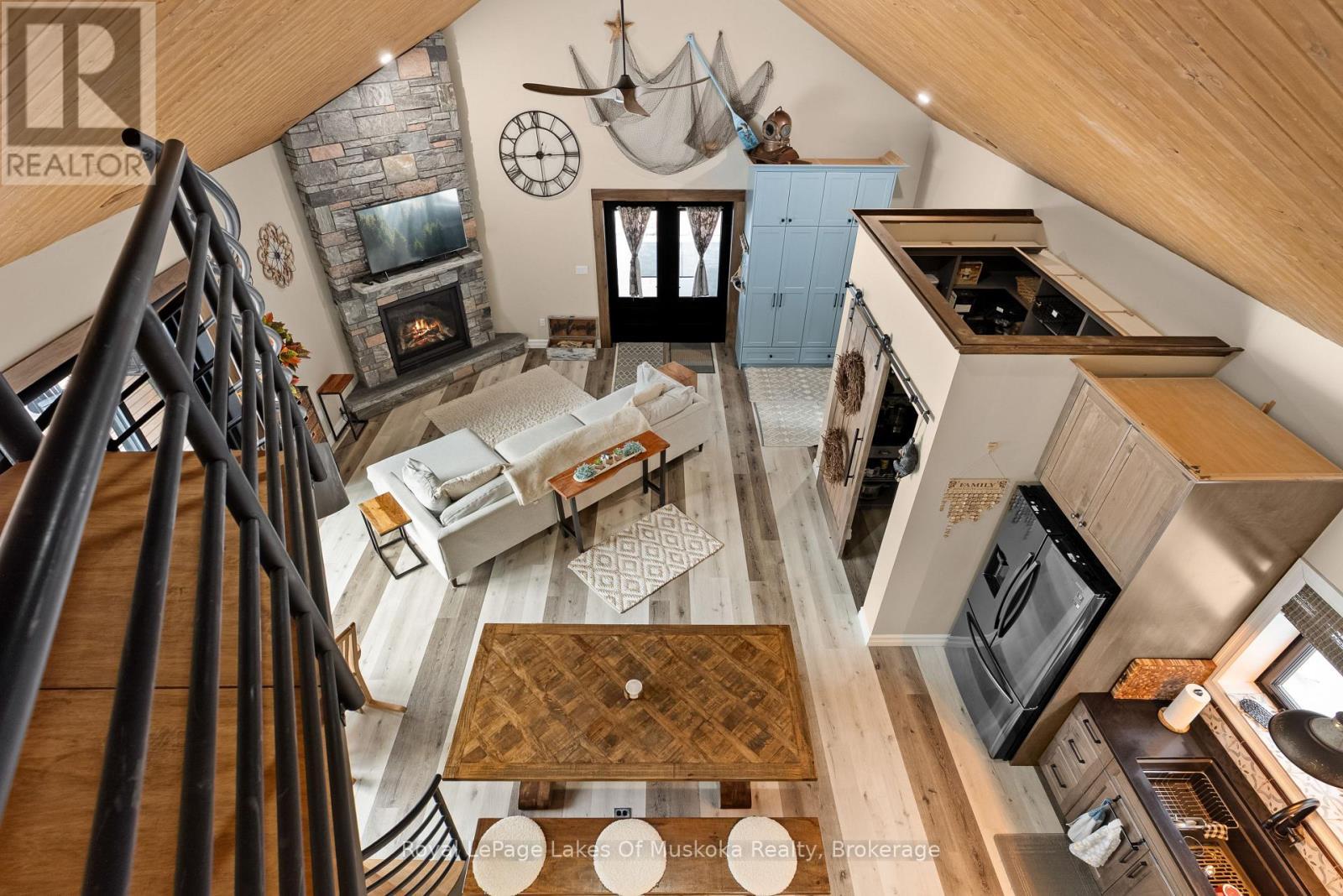 679 Boulder Road, South River, ON - Indoor Photo Showing Other Room With Fireplace