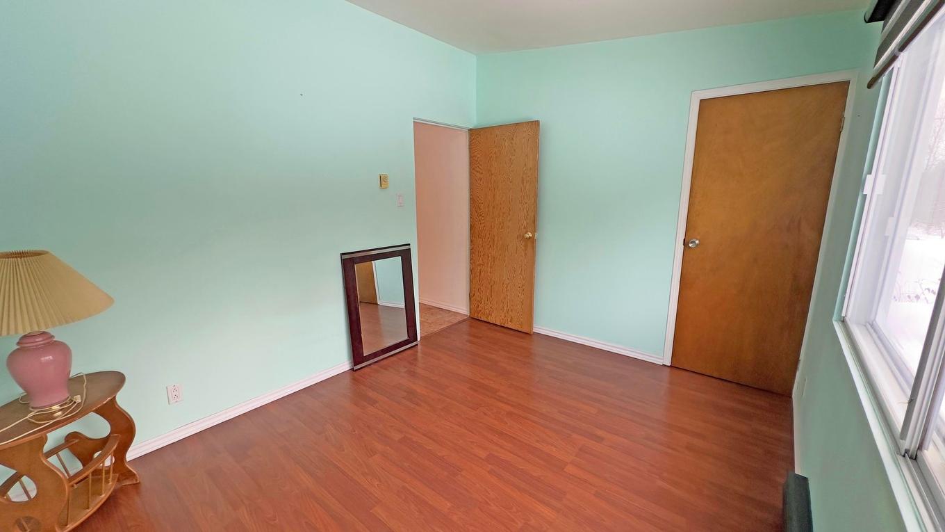 Chambre à coucher - 500 Ch. De La Carrière, Saint-Hippolyte, QC - Indoor Photo Showing Other Room