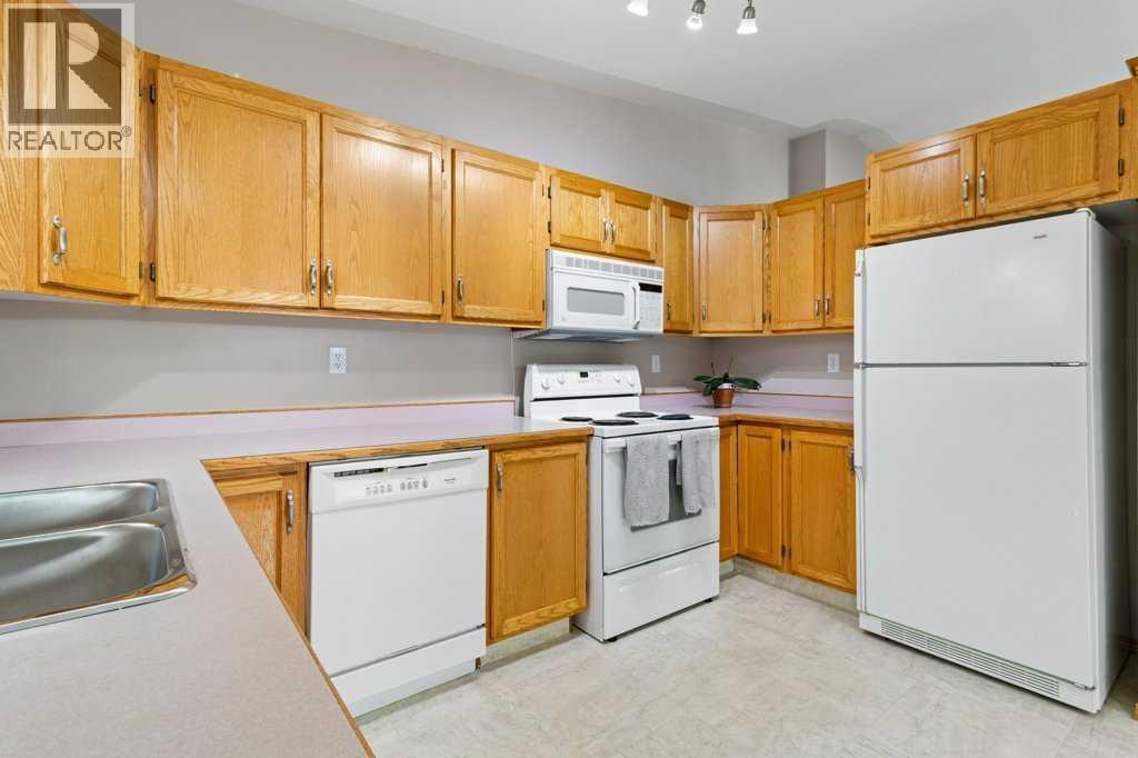 9 Dunn Close, Red Deer, AB - Indoor Photo Showing Kitchen With Double Sink