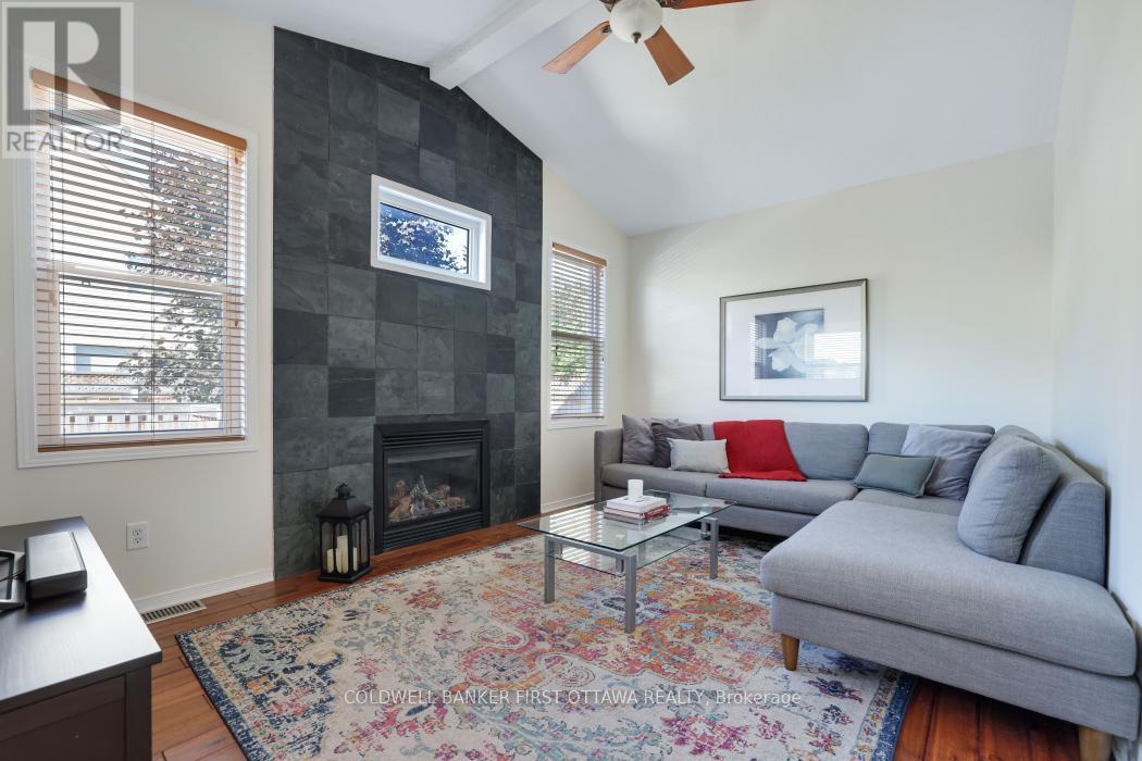 104 Streamside Crescent, Ottawa, ON - Indoor Photo Showing Living Room With Fireplace