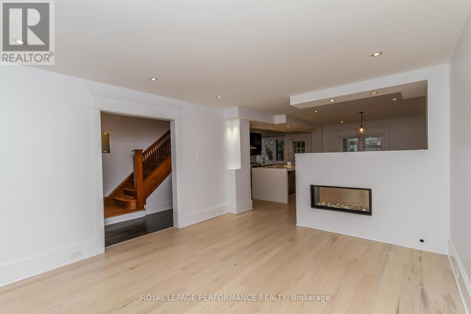 14 Clarey Avenue, Ottawa, ON - Indoor Photo Showing Other Room With Fireplace