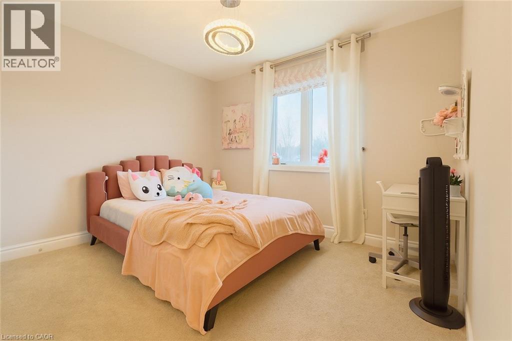 Bedroom featuring carpet floors and baseboards - 195 Water Street, St. Jacobs, ON - Indoor Photo Showing Bedroom
