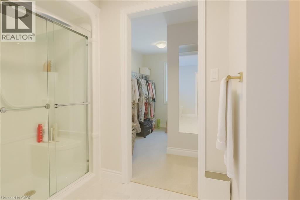 Full bath featuring a shower stall and a walk in closet - 195 Water Street, St. Jacobs, ON - Indoor Photo Showing Bathroom