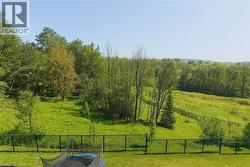 View of yard featuring a forest view -