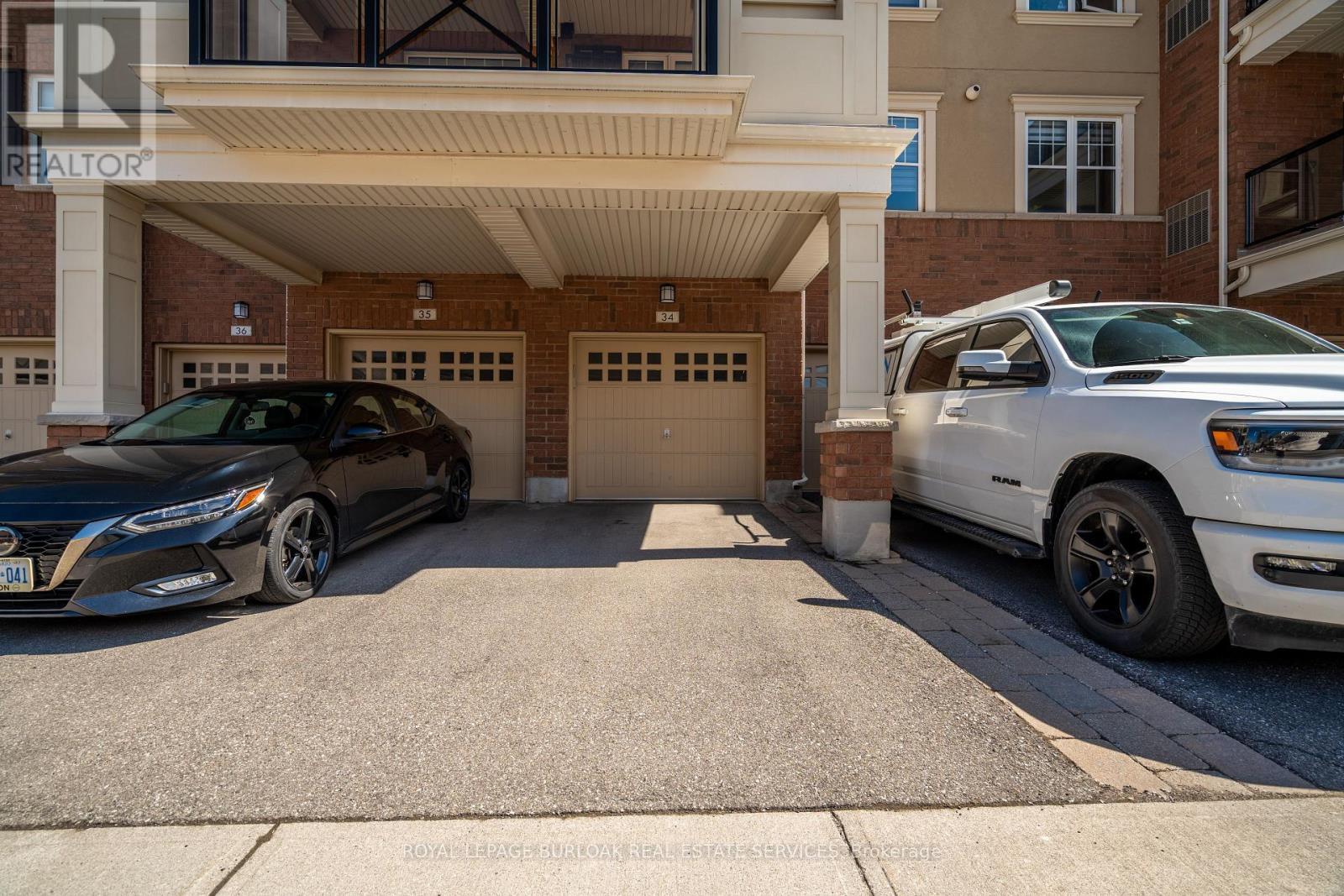 303 - 263 Georgian Drive, Oakville, ON - With Exterior