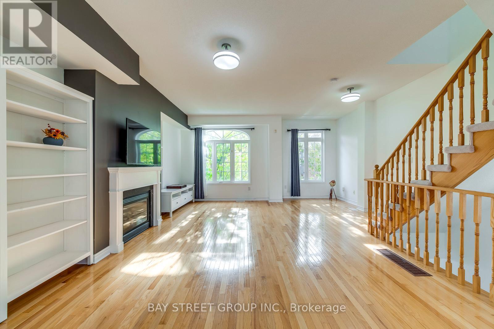 34 Stagecoach Circle, Toronto, ON - Indoor Photo Showing Other Room With Fireplace