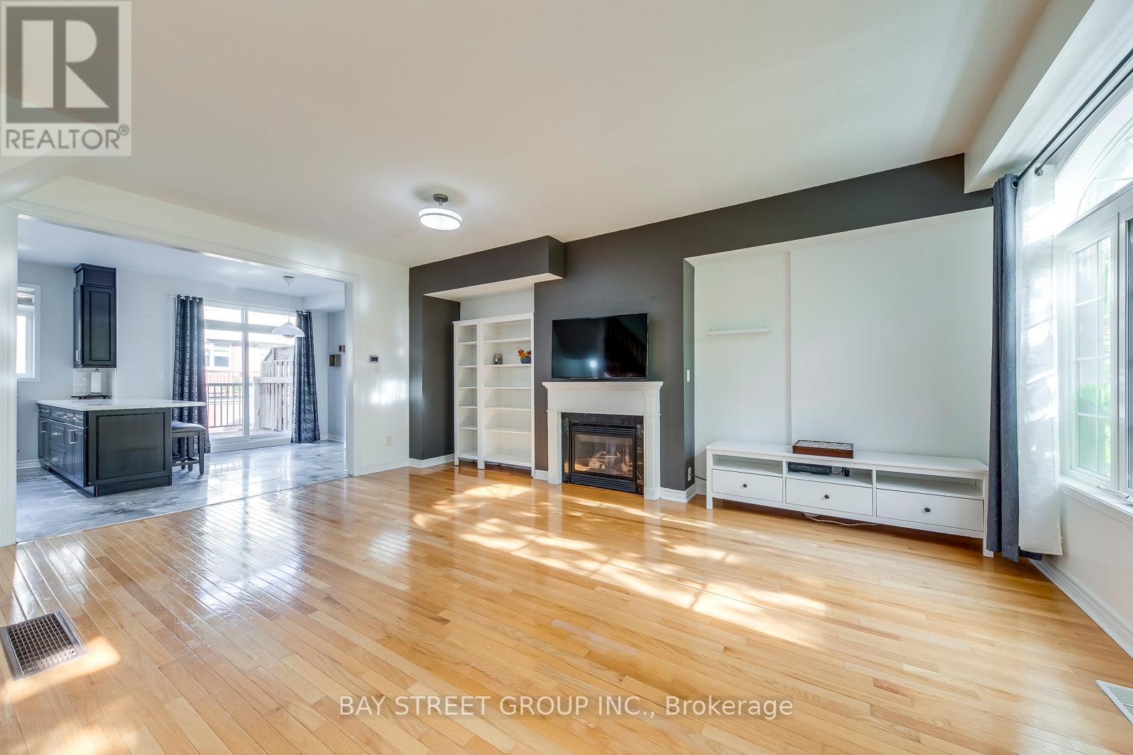34 Stagecoach Circle, Toronto, ON - Indoor Photo Showing Living Room With Fireplace