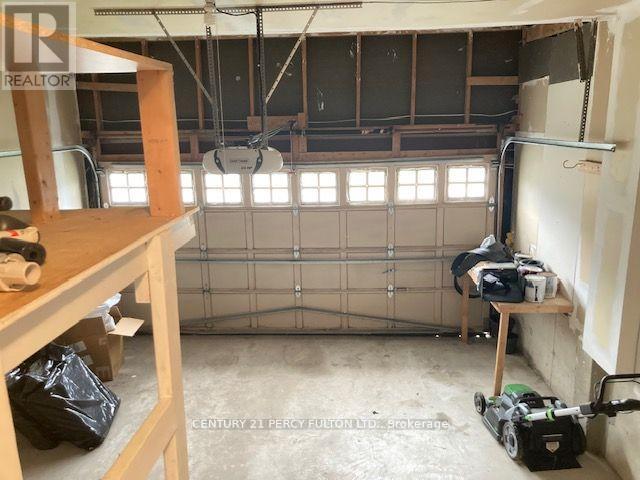 27 Whitewater Street, Whitby, ON - Indoor Photo Showing Garage