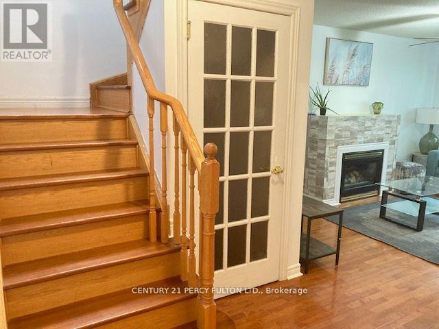 27 Whitewater Street, Whitby, ON - Indoor Photo Showing Other Room With Fireplace