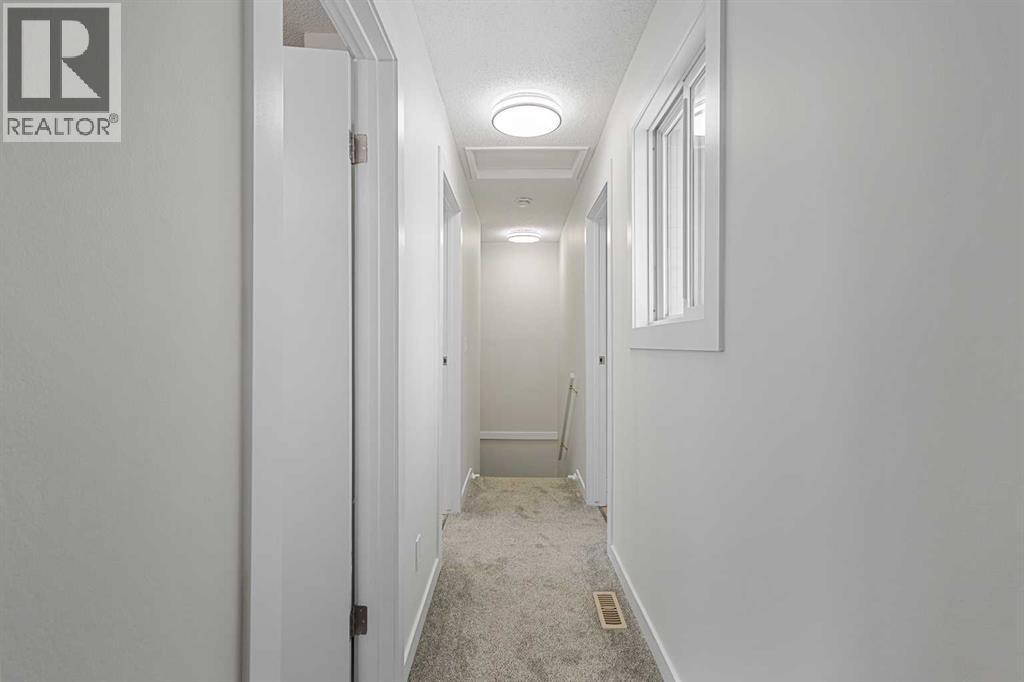 24, 64 Whitnel Court Ne, Calgary, AB - Indoor Photo Showing Other Room