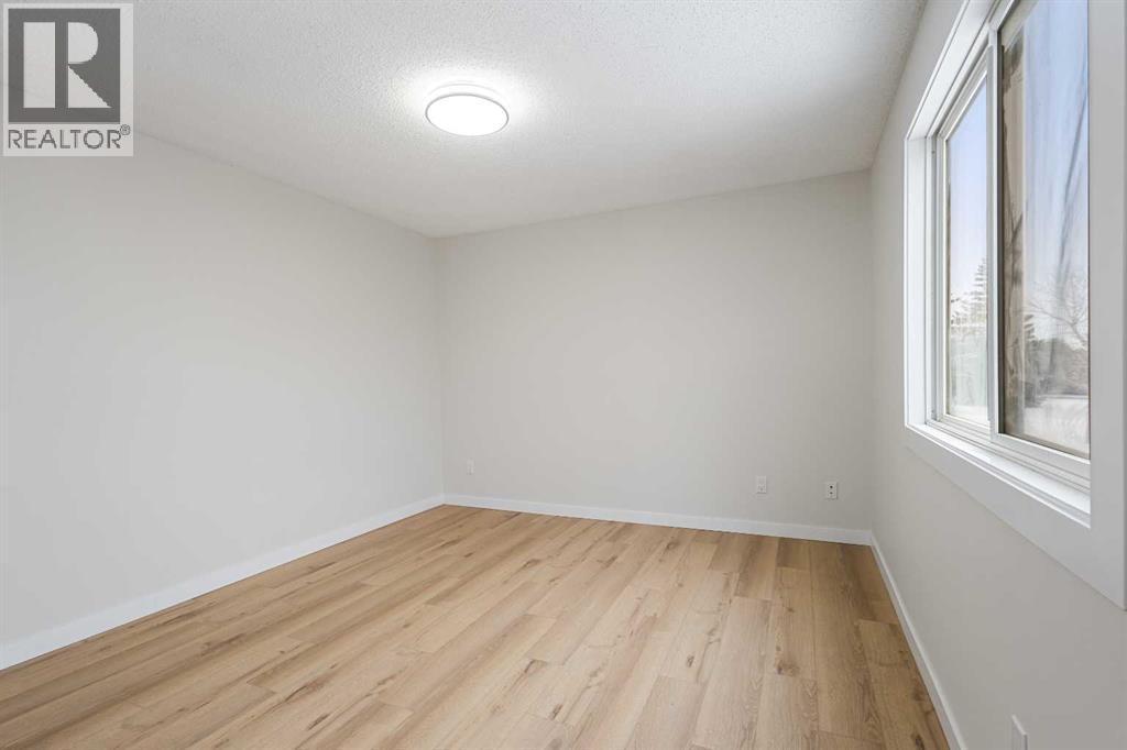 24, 64 Whitnel Court Ne, Calgary, AB - Indoor Photo Showing Other Room