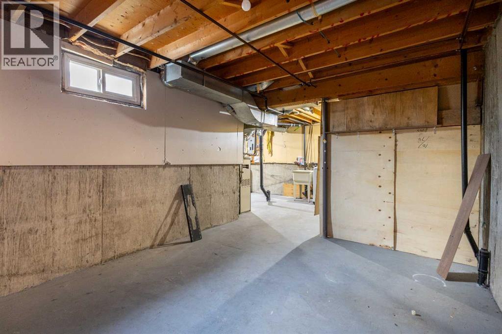 24, 64 Whitnel Court Ne, Calgary, AB - Indoor Photo Showing Basement