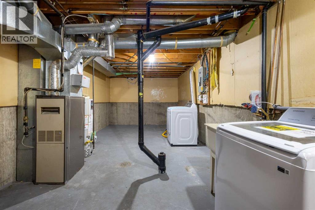 24, 64 Whitnel Court Ne, Calgary, AB - Indoor Photo Showing Basement