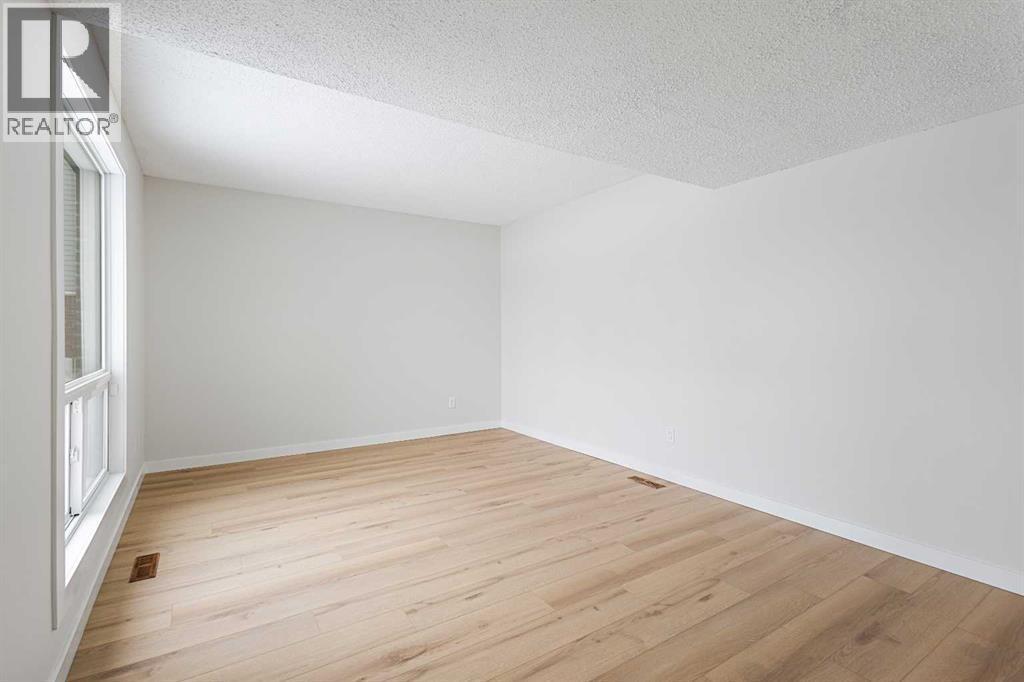 24, 64 Whitnel Court Ne, Calgary, AB - Indoor Photo Showing Other Room