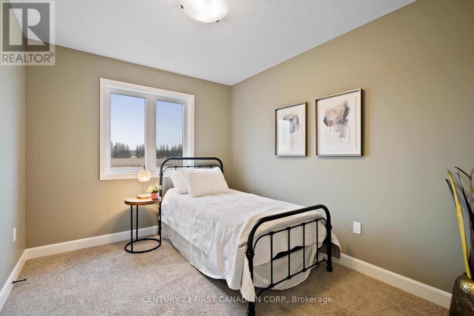 9 Twynstra Street, North Middlesex (Ailsa Craig), ON - Indoor Photo Showing Bedroom