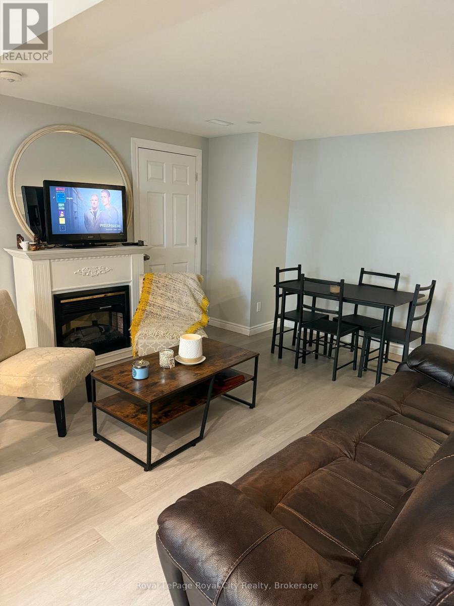 B - 30 Glenbrook Drive, Guelph (Victoria North), ON - Indoor Photo Showing Living Room With Fireplace
