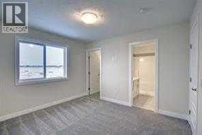 primary bedroom, 4pce ensuite - 105 Cobbestone Gate Sw, Airdrie, AB - Indoor Photo Showing Other Room