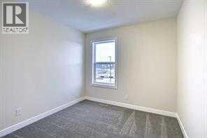 3rd bedroom - 105 Cobbestone Gate Sw, Airdrie, AB - Indoor Photo Showing Other Room