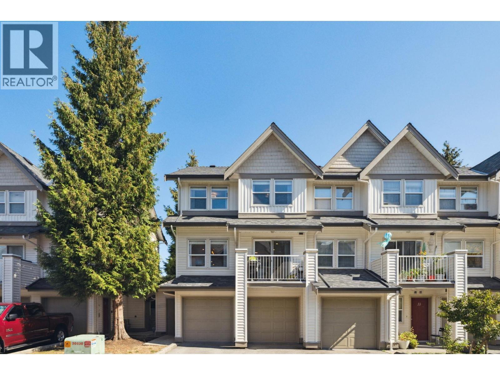 34 1260 Riverside Drive, Port Coquitlam, BC - Outdoor With Balcony With Facade
