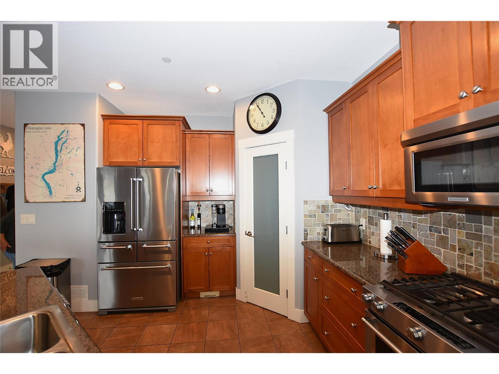 stainless steel appliances - 3721 Razorback Court, Vernon, BC - Indoor Photo Showing Kitchen With Stainless Steel Kitchen