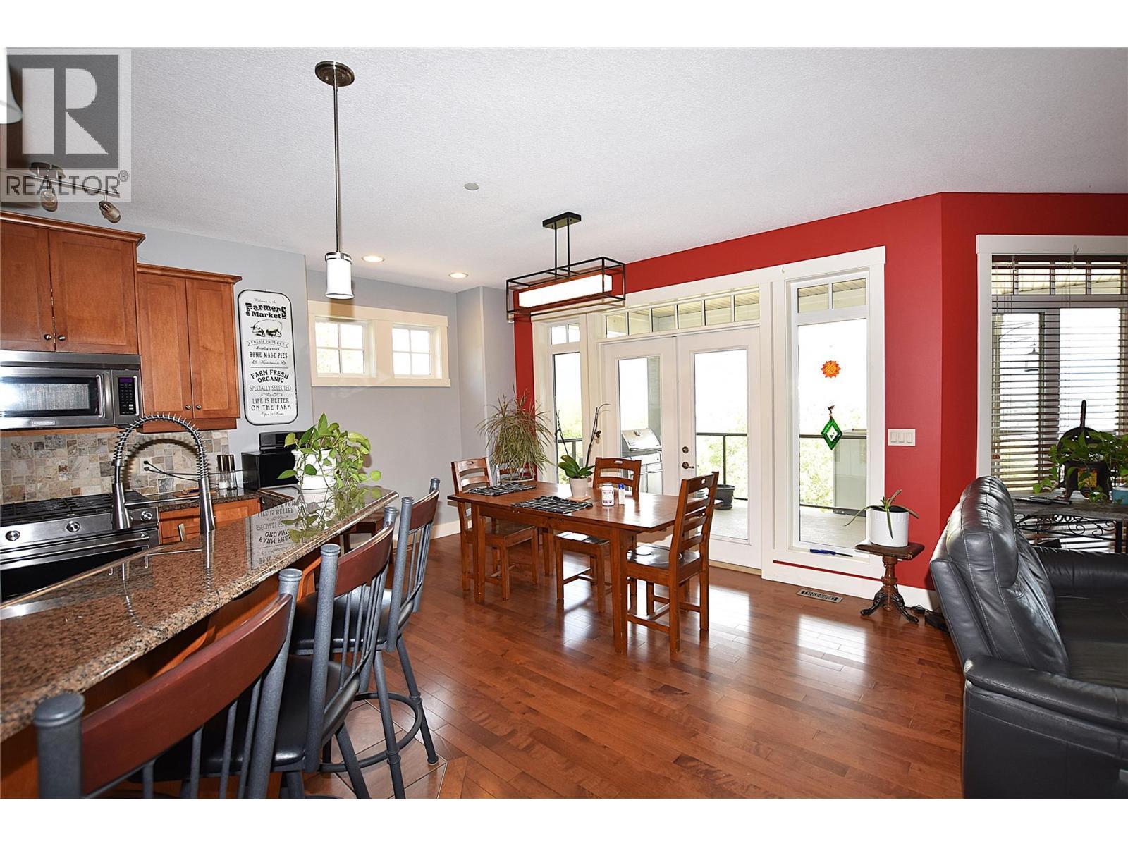 dining area beside the kitchen - 3721 Razorback Court, Vernon, BC - Indoor