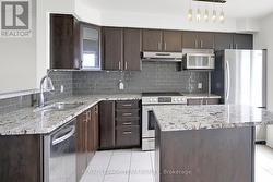 Tons of cabinet & counter space in Kitchen. -