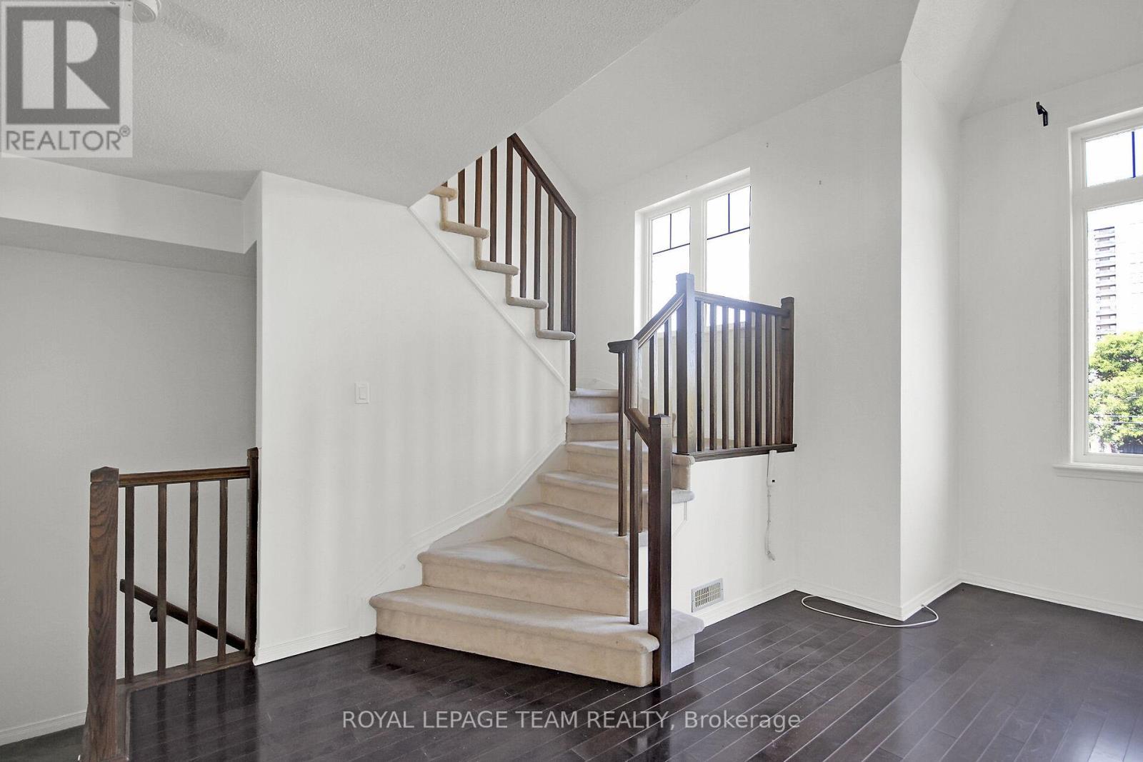 Stairs to 2nd Level. - 151 - 1512 Walkley Road S, Ottawa, ON - Indoor Photo Showing Other Room
