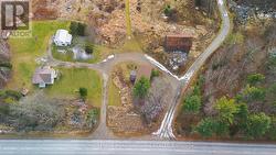 Views of the driveway and Tilson Creek Rd -