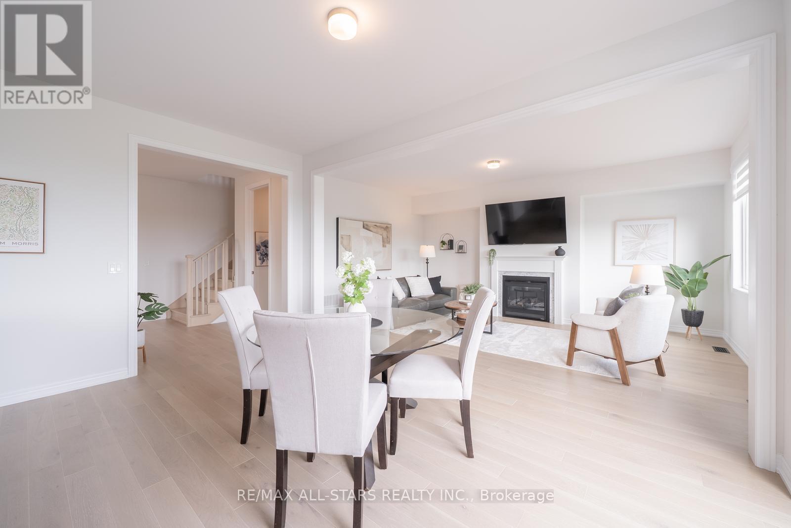 129 Busato Drive, Whitchurch-Stouffville, ON - Indoor Photo Showing Dining Room With Fireplace