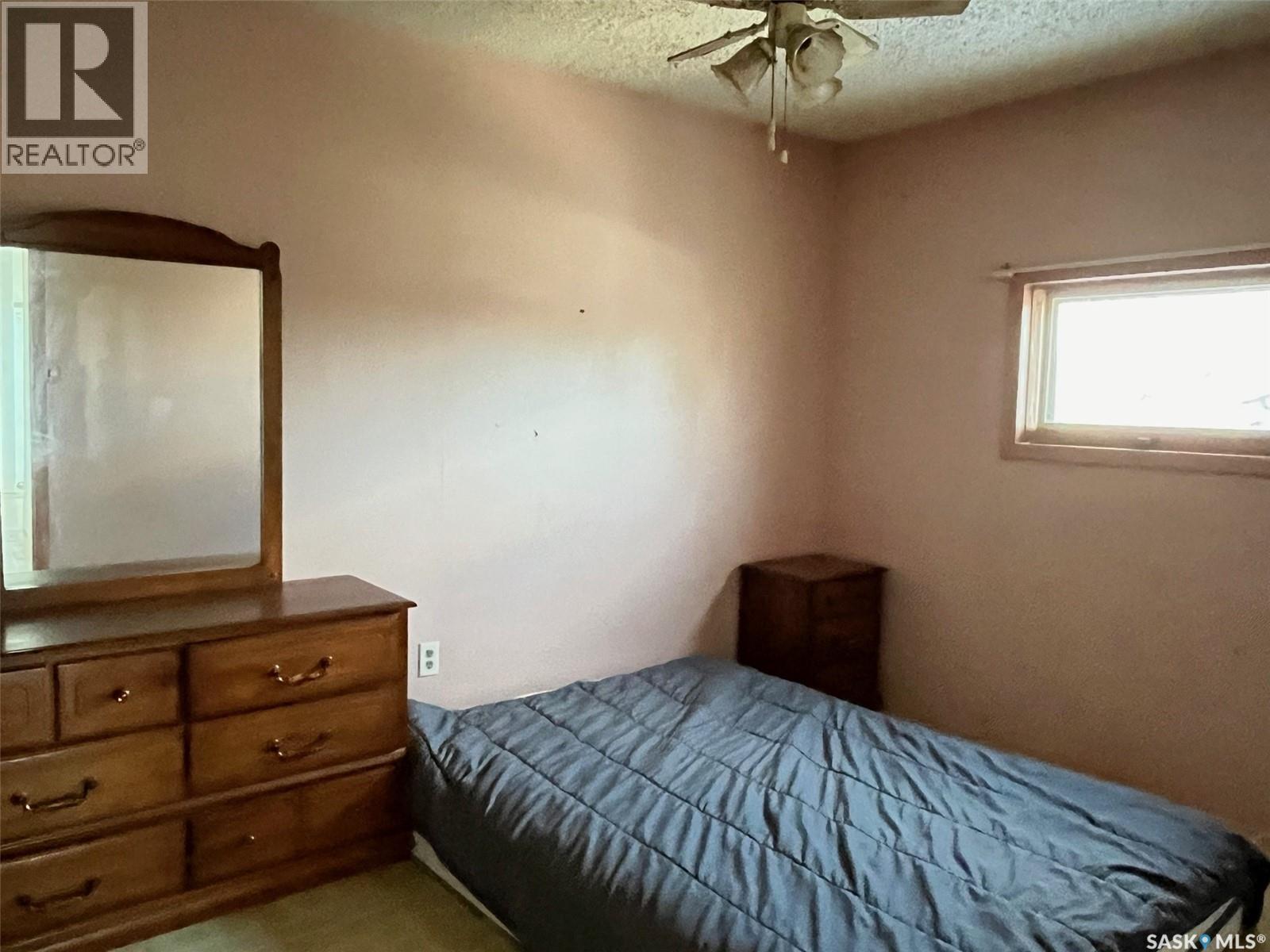 211 2Nd Street E, Lafleche, SK - Indoor Photo Showing Bedroom