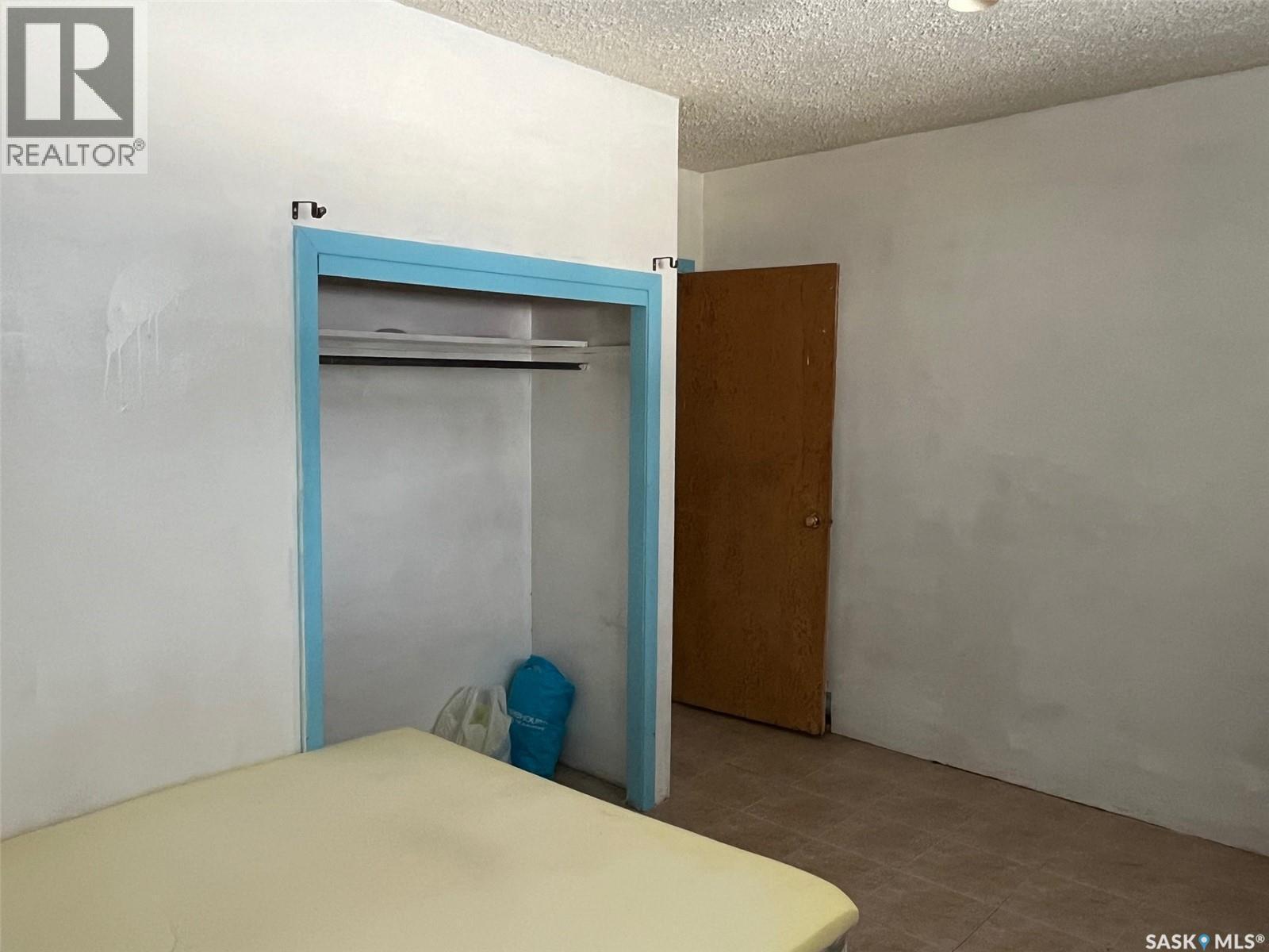 211 2Nd Street E, Lafleche, SK - Indoor Photo Showing Bedroom