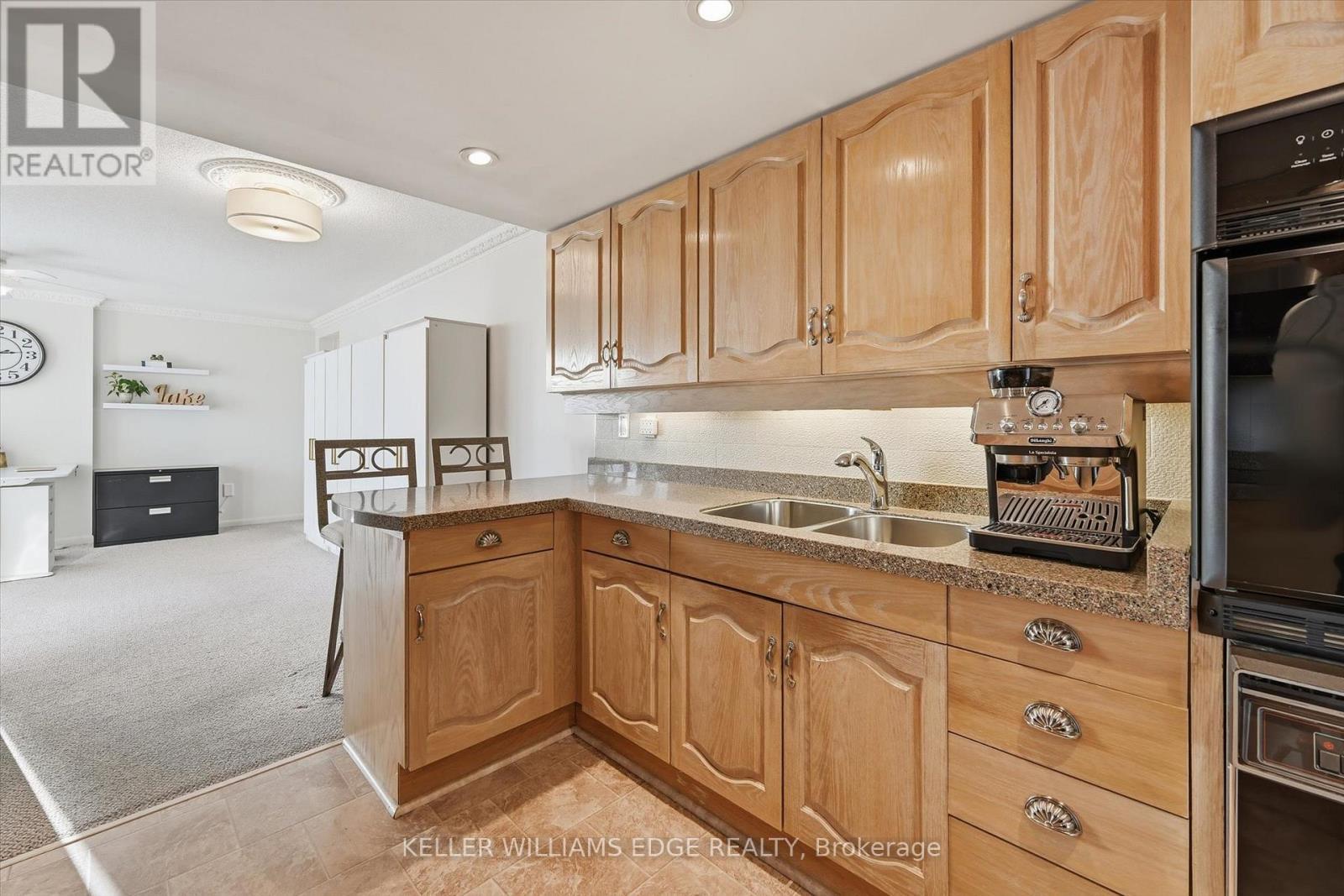 Kitchen - 1808 - 2170 Marine Drive, Oakville, ON - Indoor Photo Showing Kitchen With Double Sink