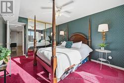 Bedroom #2 with walk-out to Balcony -