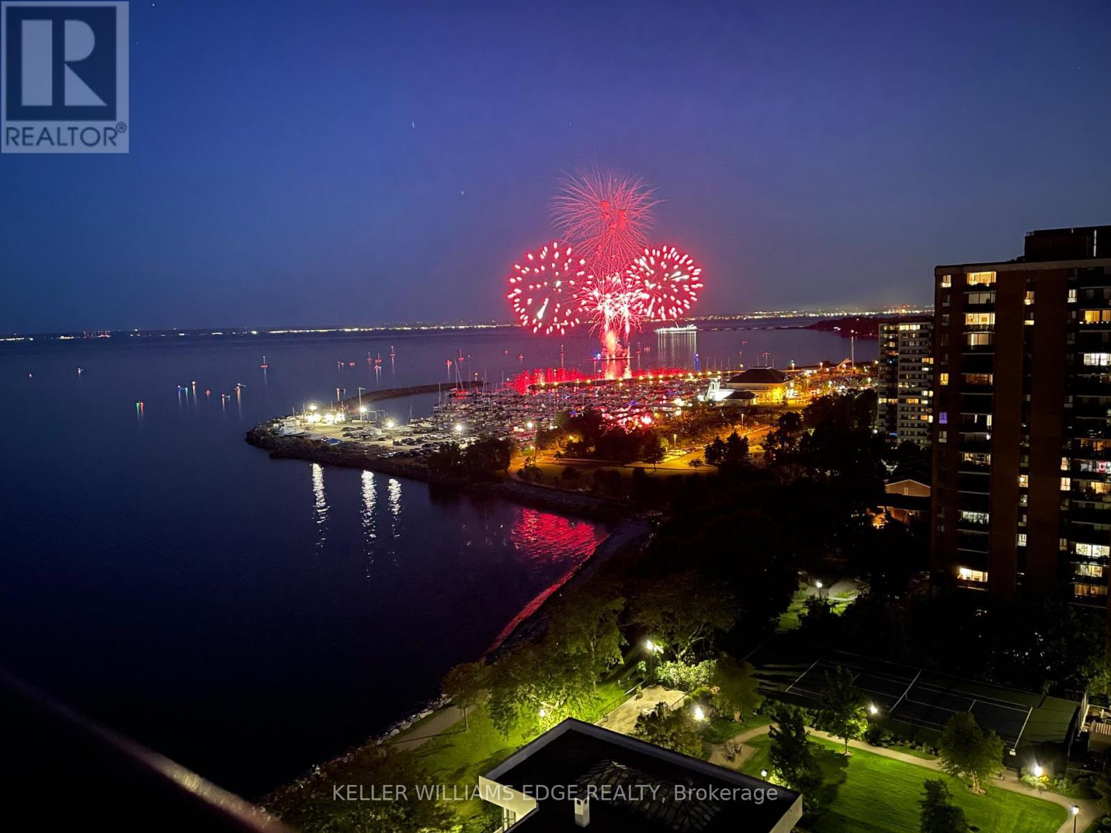 Balcony view on Canada Day - 1808 - 2170 Marine Drive, Oakville, ON - Outdoor With Body Of Water With View