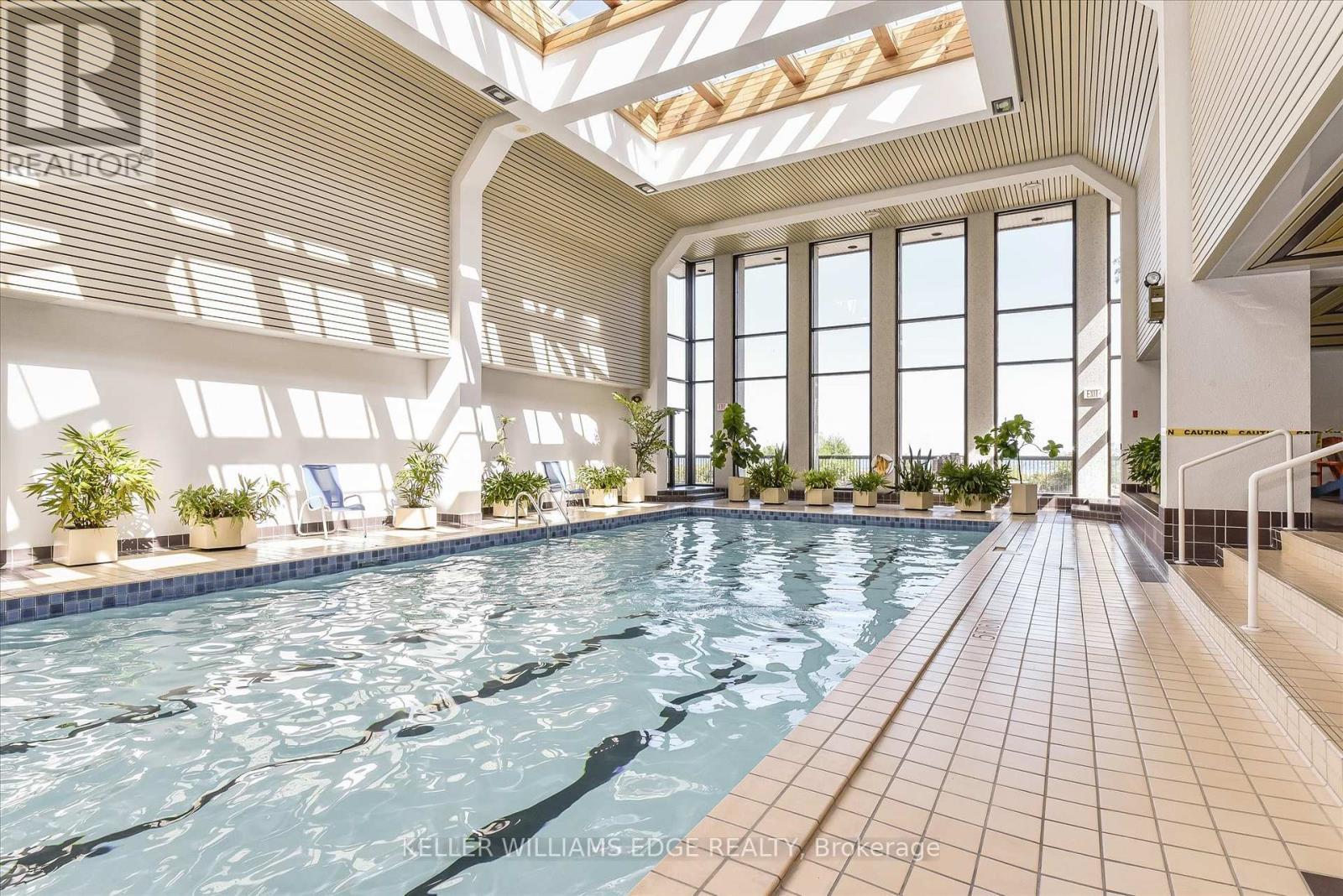 1808 - 2170 Marine Drive, Oakville, ON - Indoor Photo Showing Other Room With In Ground Pool