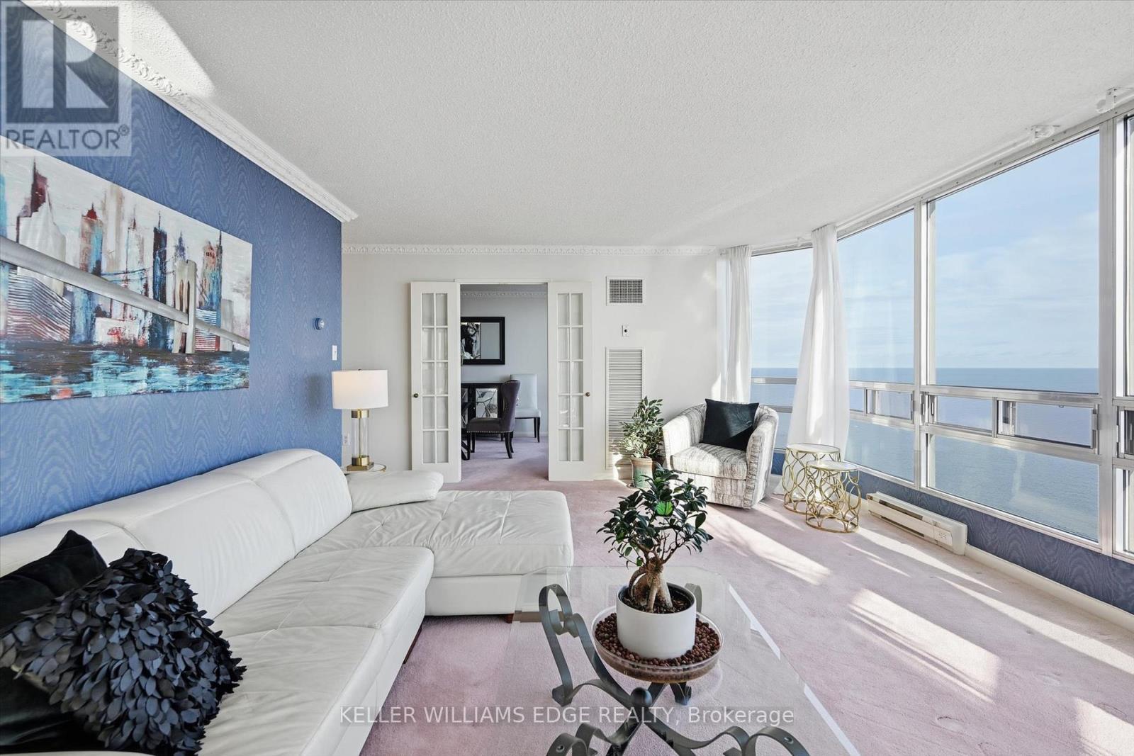 Living Room with Lake view - 1808 - 2170 Marine Drive, Oakville, ON - Indoor Photo Showing Living Room