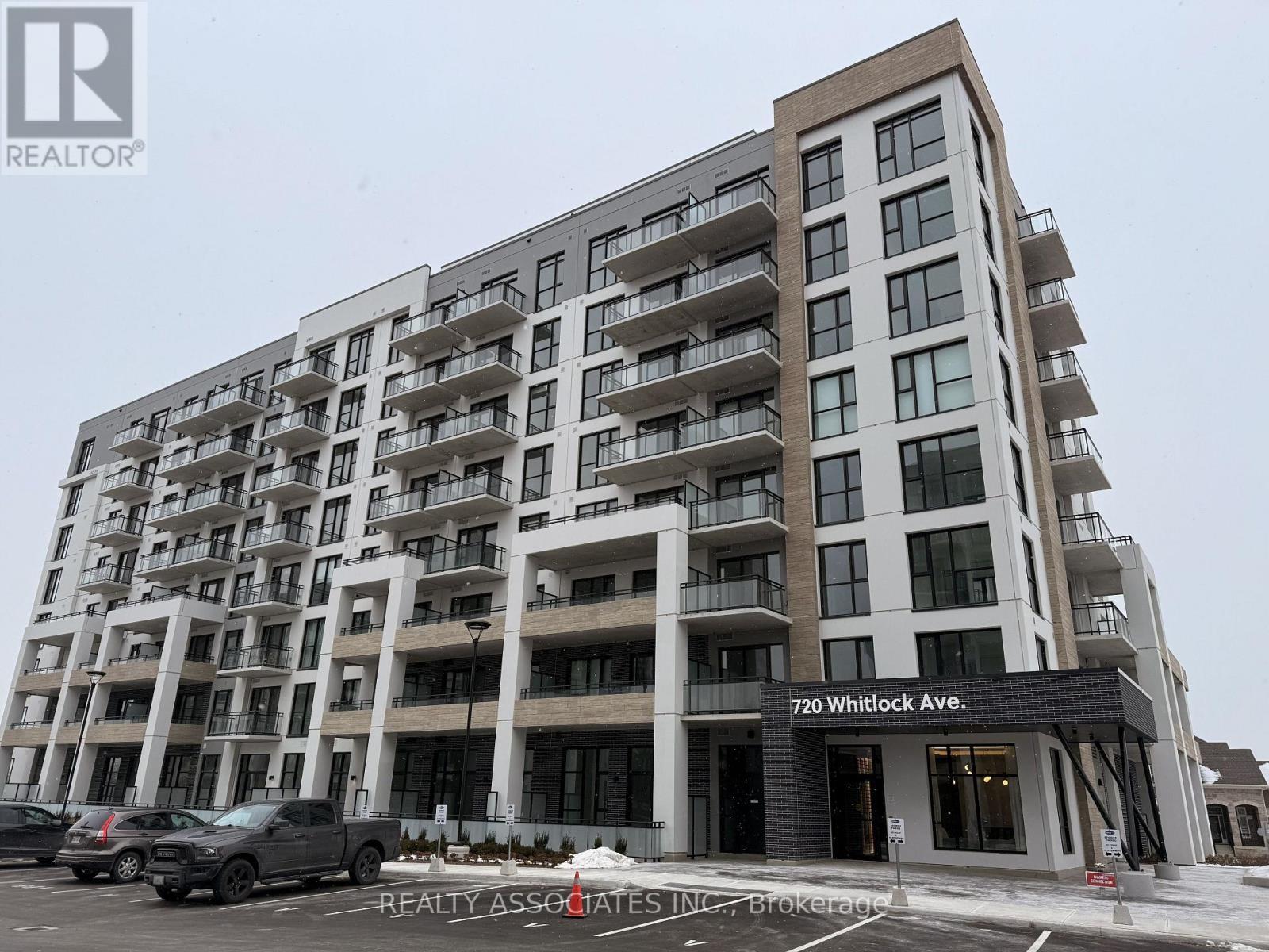 203 - 720 Whitlock Avenue, Milton, ON - Outdoor With Facade