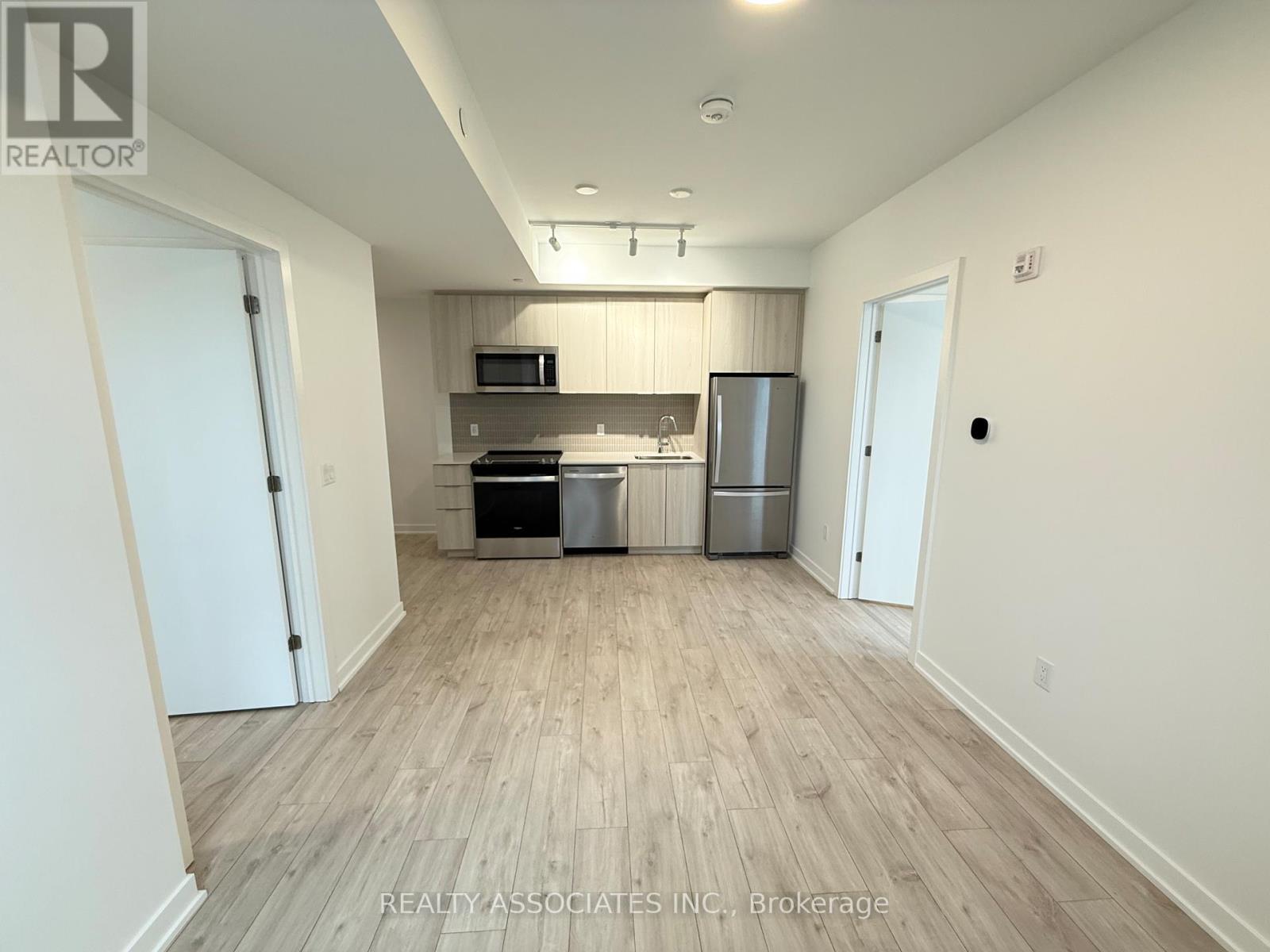 203 - 720 Whitlock Avenue, Milton, ON - Indoor Photo Showing Kitchen With Stainless Steel Kitchen