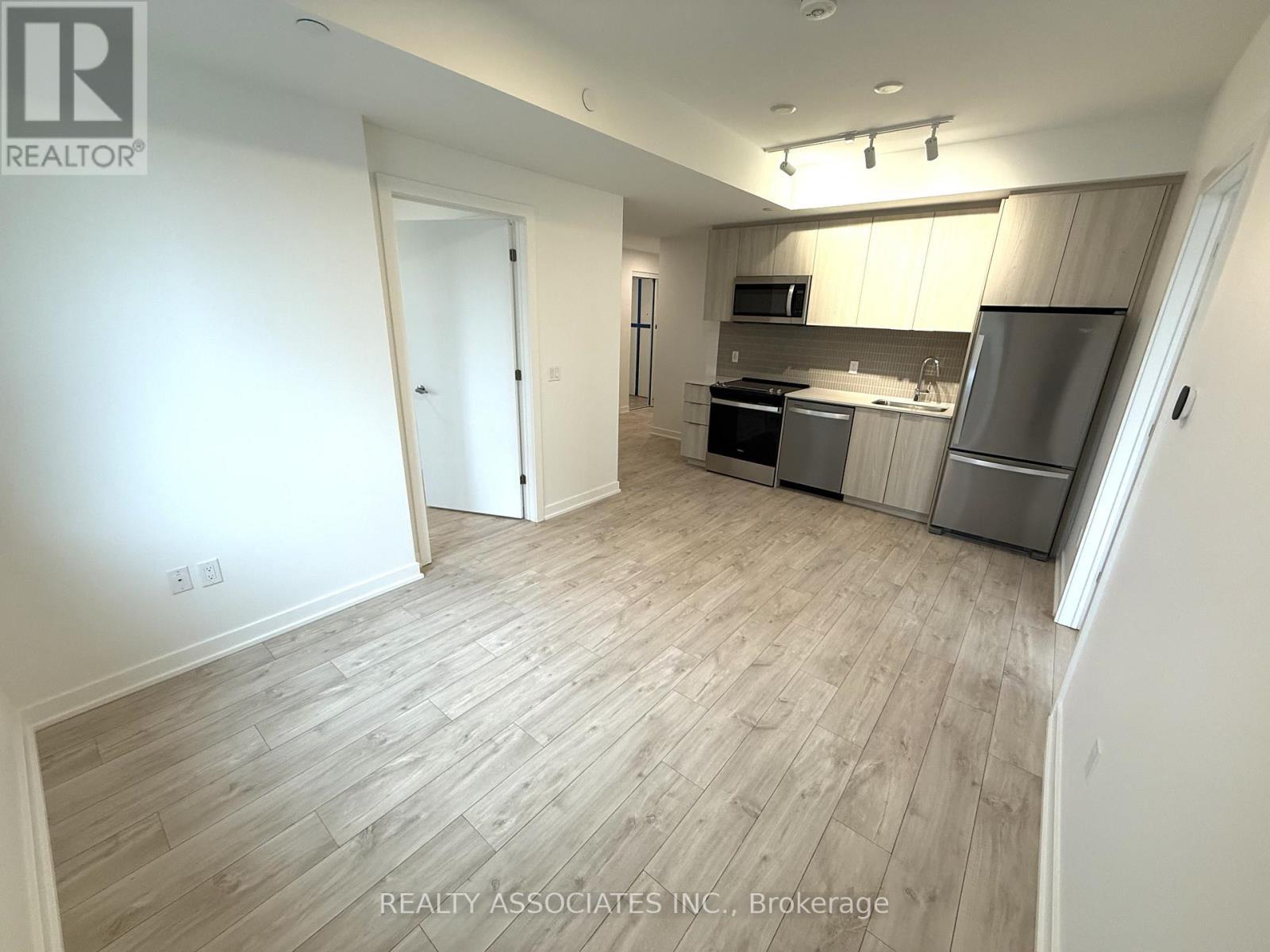 203 - 720 Whitlock Avenue, Milton, ON - Indoor Photo Showing Kitchen With Stainless Steel Kitchen